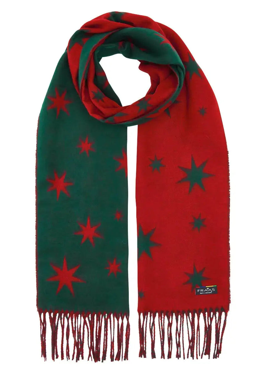 A Patagonia scarf with a split design of dark green on one side and bright red on the other, both decorated with star patterns, finished with fringed ends.