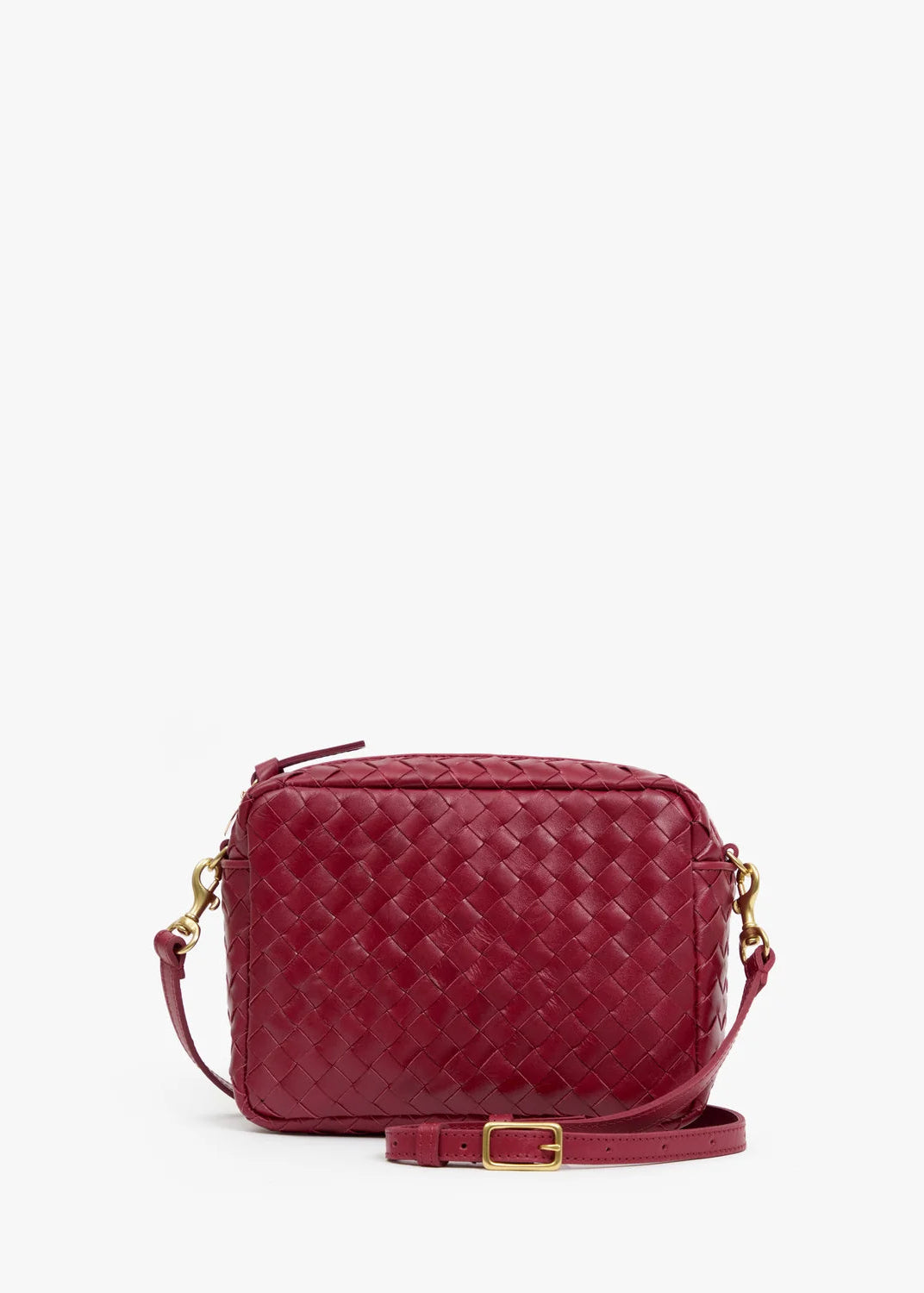 A small woven leather crossbody bag in deep burgundy red with gold-tone hardware and a matching adjustable shoulder strap, displayed against a clean white background.