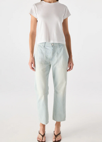Person wearing a white t-shirt and light blue jeans on a white background