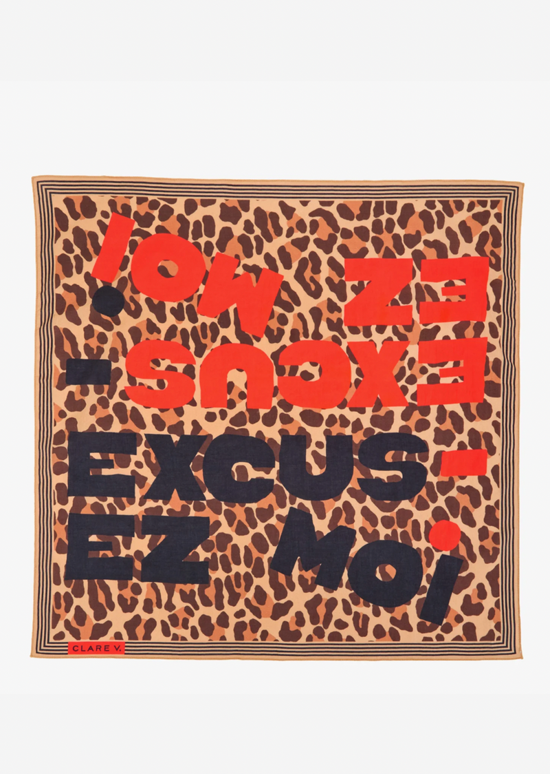 Leopard print scarf with colorful text on a white background