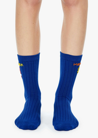 Blue socks with yellow text on a white background