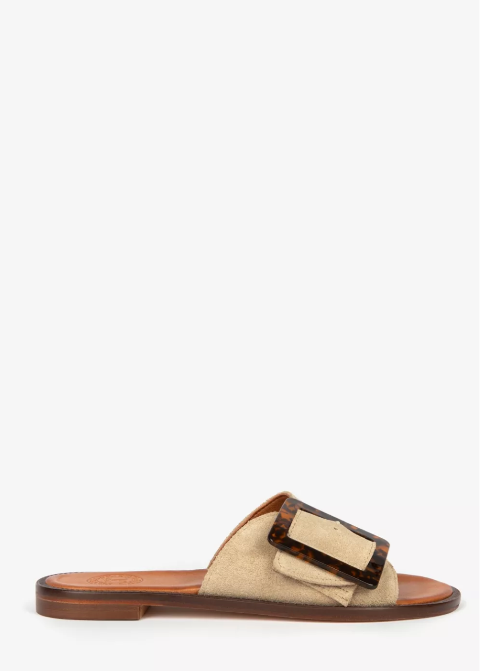 Beige sandal with brown buckle on a white background