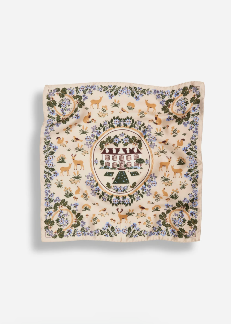 A square scarf with a detailed woodland illustration pattern, featuring deer, trees, birds, and a central circular emblem, displayed flat against a light gray background.