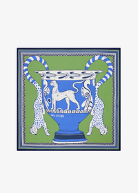 A square art print featuring a blue and white classical-style urn with two spotted white lions on a green background, bordered by a dark blue frame, shown against a light gray background.