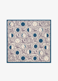 A square scarf featuring a celestial pattern of moon phases, suns, and faces in blue and cream on a white background, framed by a solid blue border.