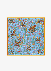 A square scarf featuring a vibrant, detailed print of birds, flowers, and foliage on a light blue background, finished with a thin gold border.