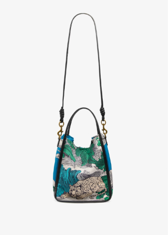 A small shoulder bag with a black leather trim and strap, featuring a vibrant green, blue, and beige animal print body, shown against a plain white background.