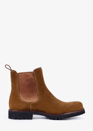 A brown suede Chelsea boot with a black lug sole and a brown elastic side panel, shown in profile against a plain white background.
