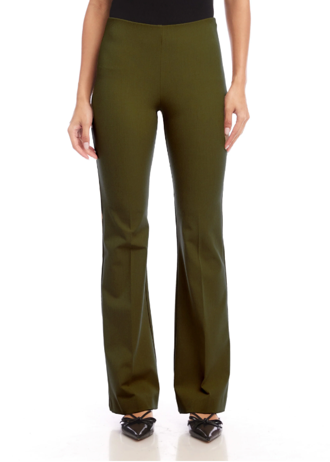 A model wearing olive green wide-leg pants, paired with a black top and black pointed flats, shown from the waist down on a white studio background.