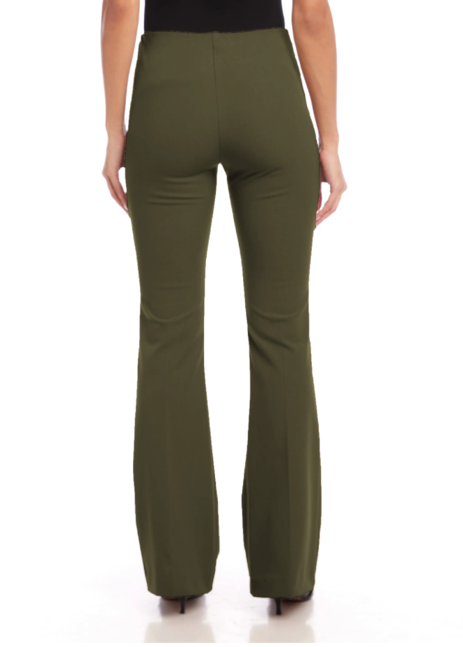 A person shown from the back wearing olive green flared pants and a black top, photographed against a clean white studio background.