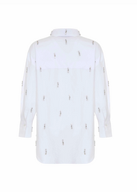 A white long-sleeve button-up shirt shown from the back, featuring small metallic embroidered figures spaced vertically across the fabric.