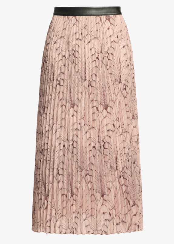 A pleated midi skirt in a dusty pink color with a dark brown palm leaf pattern, featuring a contrasting black faux-leather waistband, shown against a plain white background.