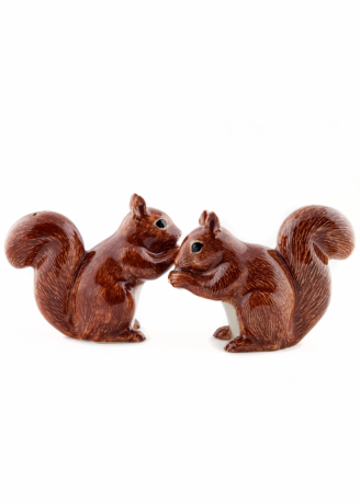 Two brown ceramic squirrels facing each other on a plain white background.