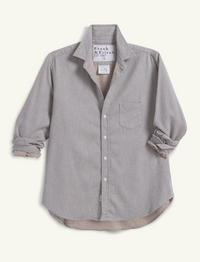 A light gray long-sleeve button-up shirt by Frank & Raven, featuring a chest pocket, rolled cuffs, and a visible inner lining in a warm taupe-beige color, laid flat against a light cream background.