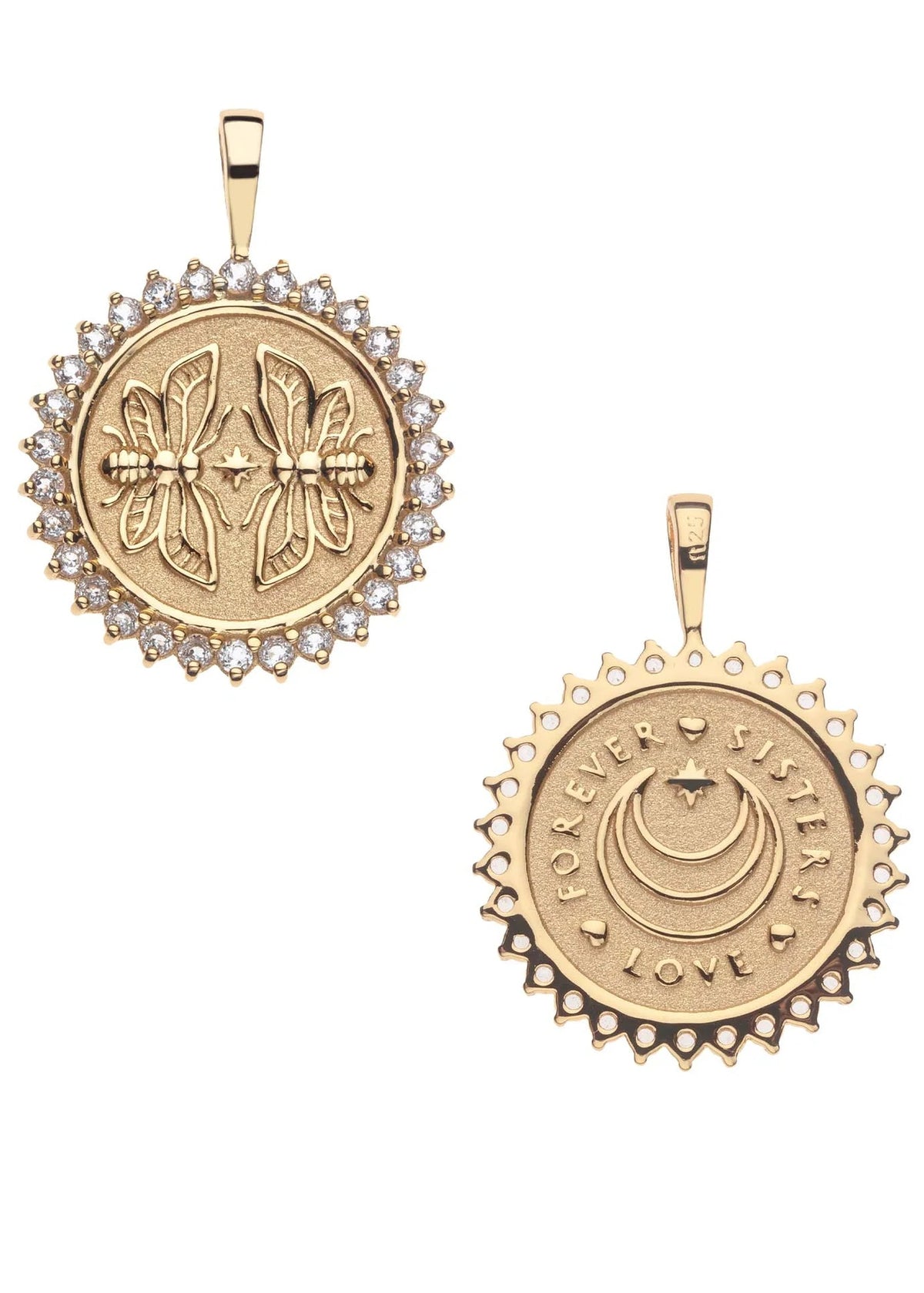 Two gold pendants with intricate designs on a white background